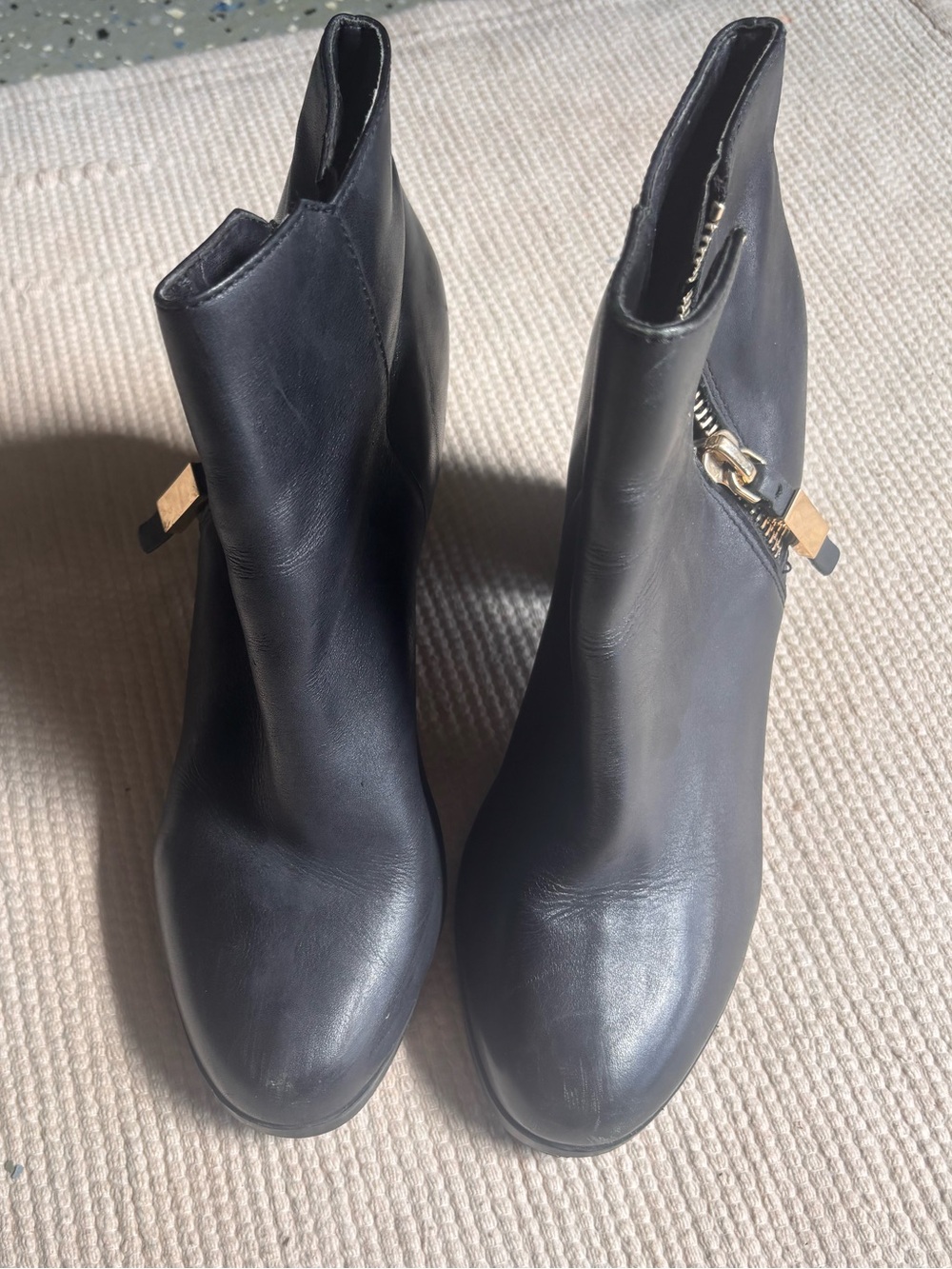 Aldo Black Leather Ankle Booties with Gold Zip Accent